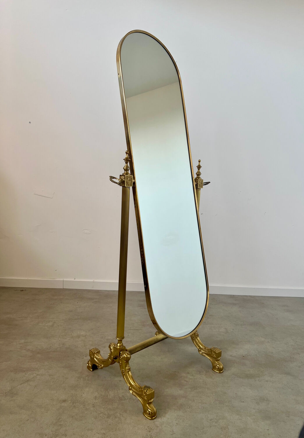 Old free-standing mirror in gilded brass in psychedelic neoclassical style Years 40 France