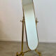Old free-standing mirror in gilded brass in psychedelic neoclassical style Years 40 France