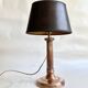 Copper lamp, fabric cable, sewn lampshade and leather.
