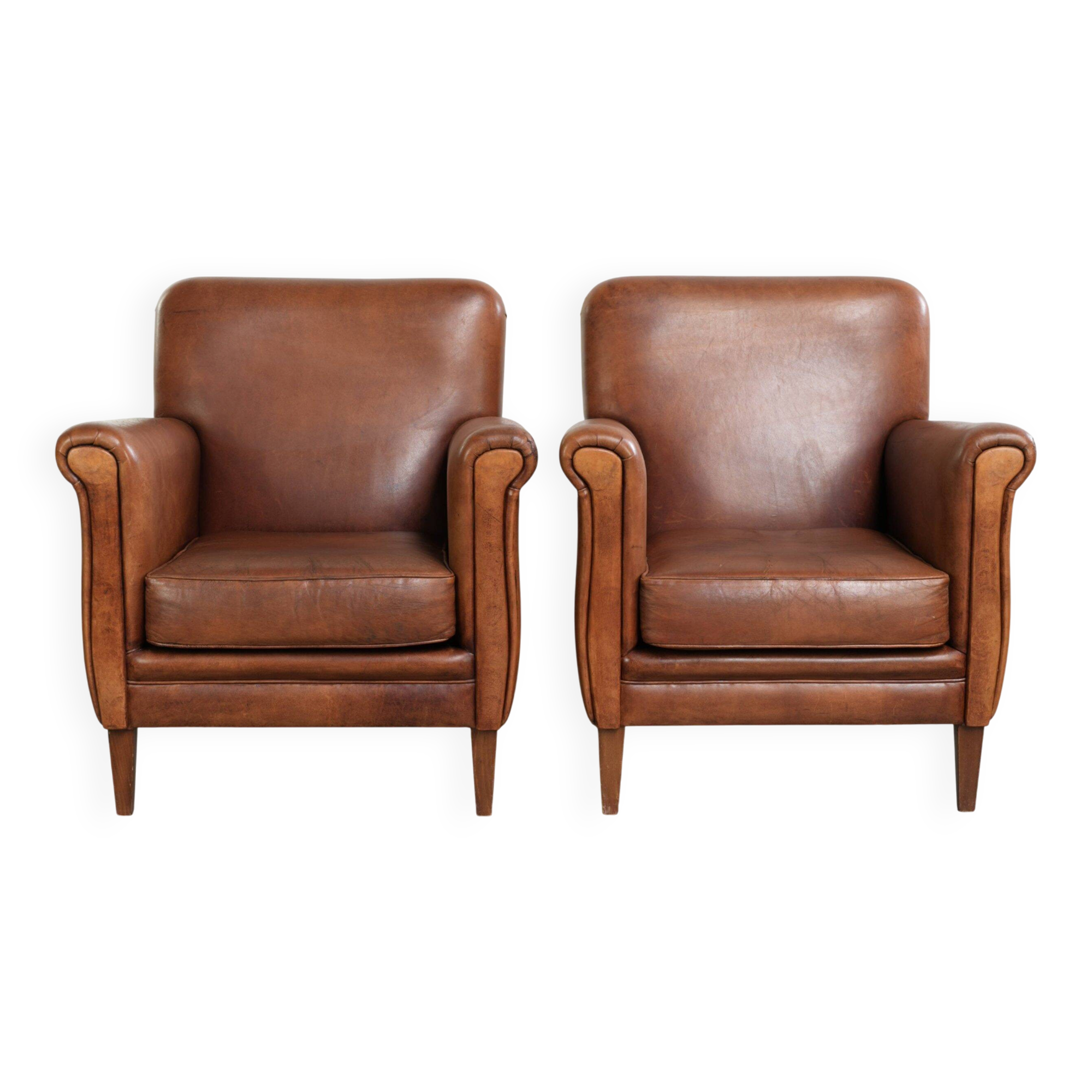 Comfortable set of sheepskin armchairs with and a timeless design