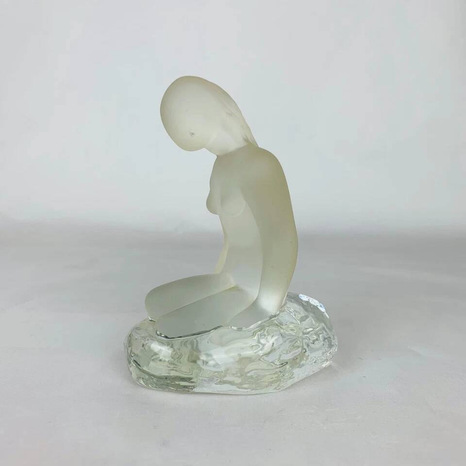 Vintage moulded glass mermaid sculpture.