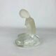 Vintage moulded glass mermaid sculpture.