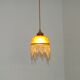 Vintage French amber mottled glass hanging ceiling light with beaded fringe.