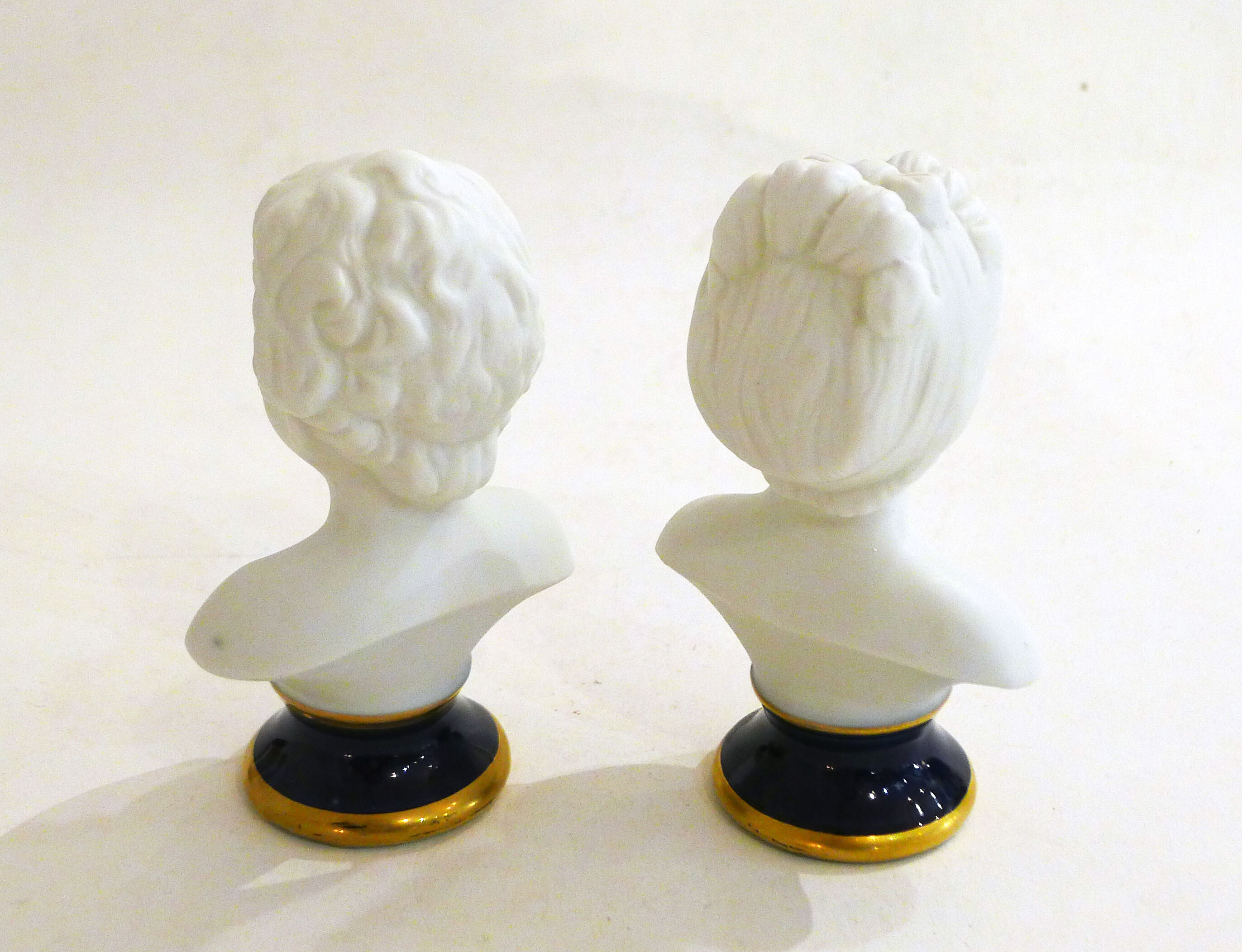 Pair of busts in biscuits