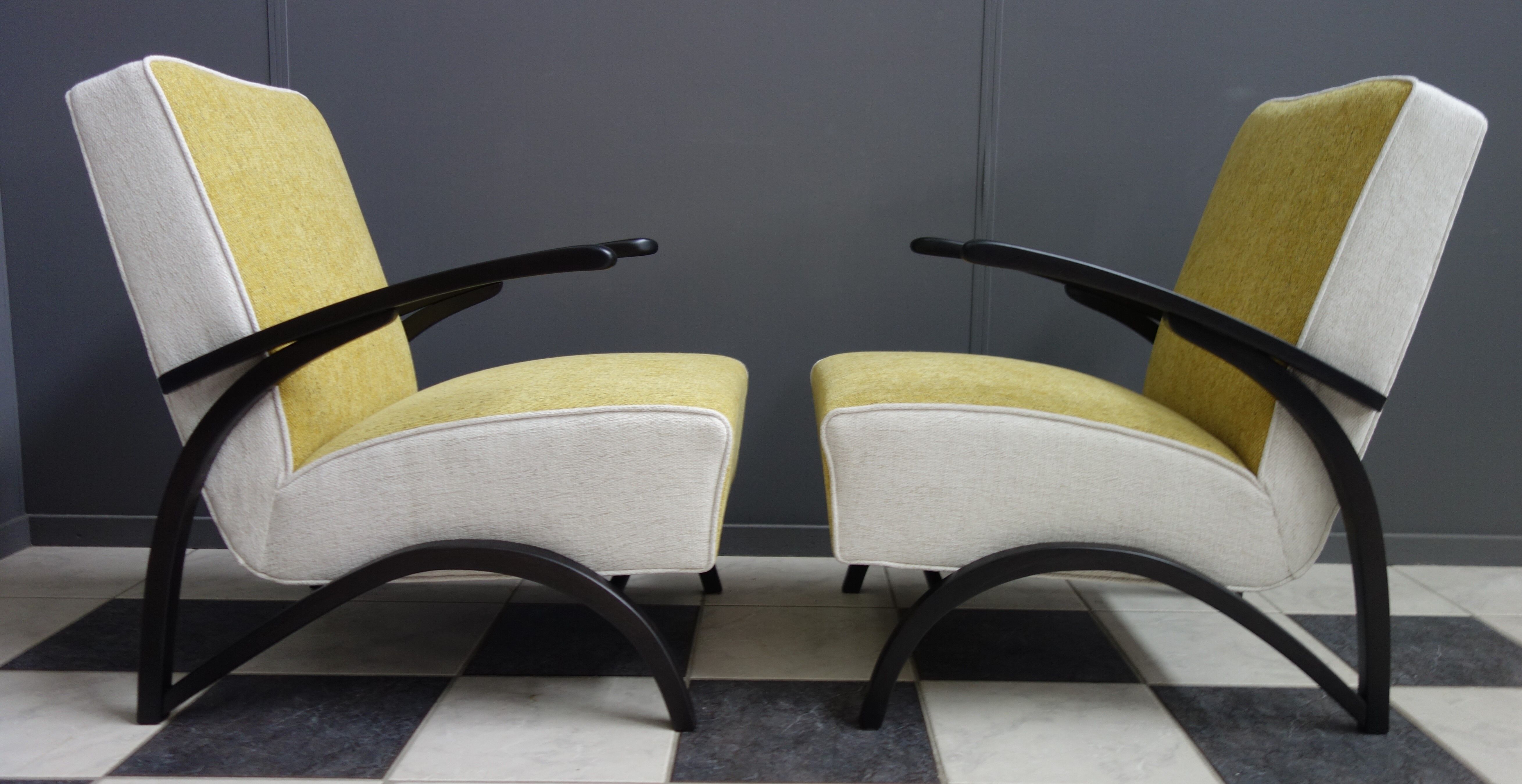 Jindrich halabala chairs yellow and white