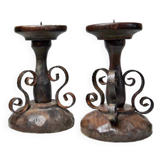 Pair of wooden and wrought iron candle holders