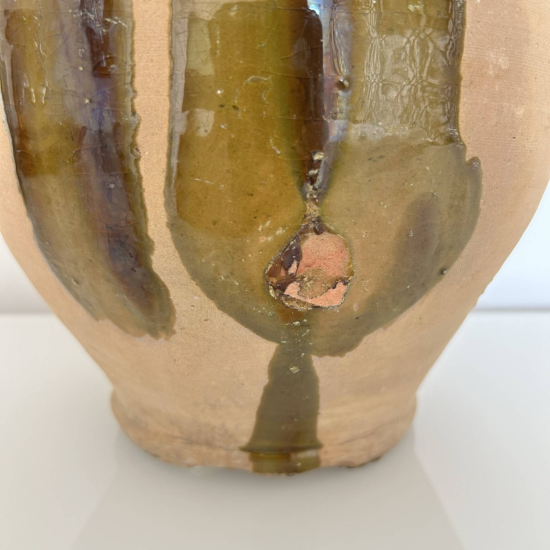 Old jar with brushstroke decoration