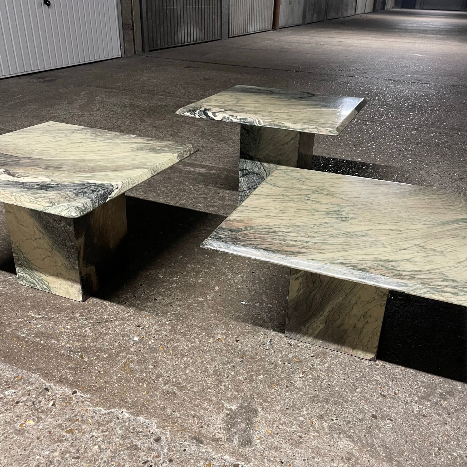 Series of three nesting tables in green marble, 1970