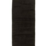 Small vintage flat-woven black rug.