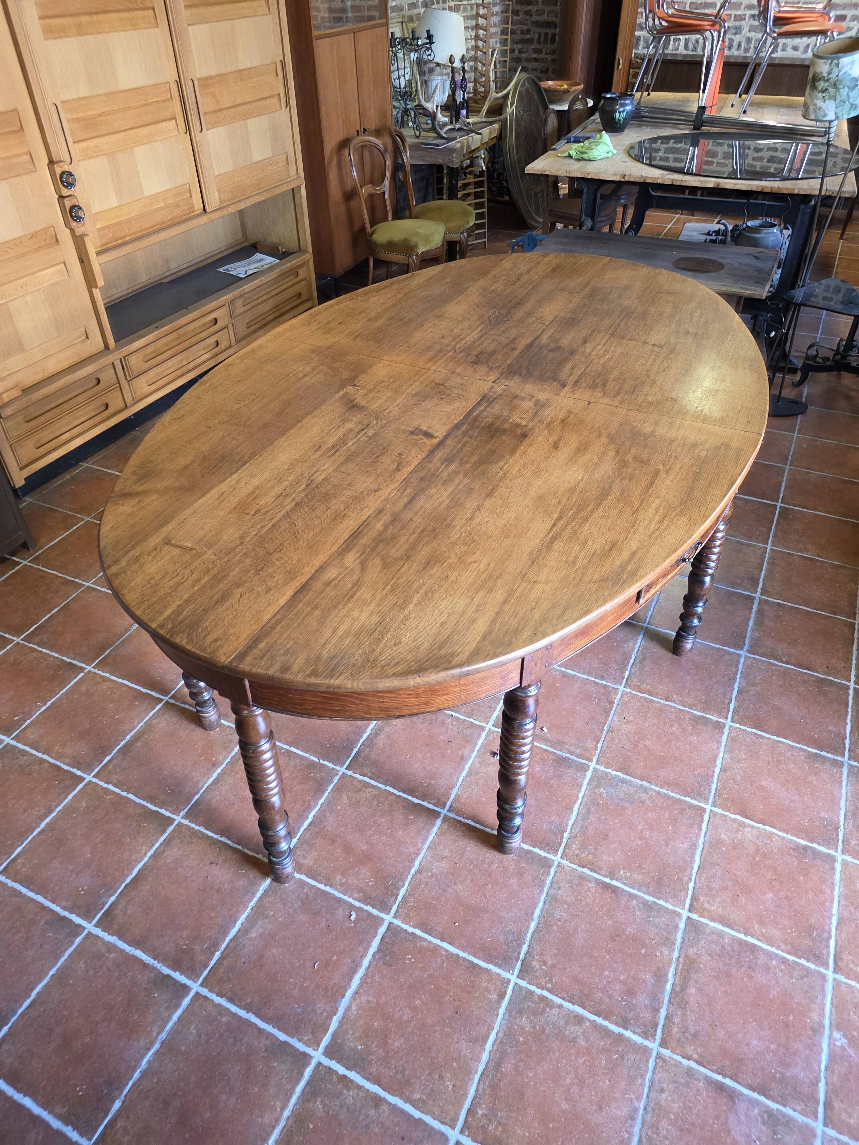 Large oval monastery table in solid oak, 19th century, 243×154cm