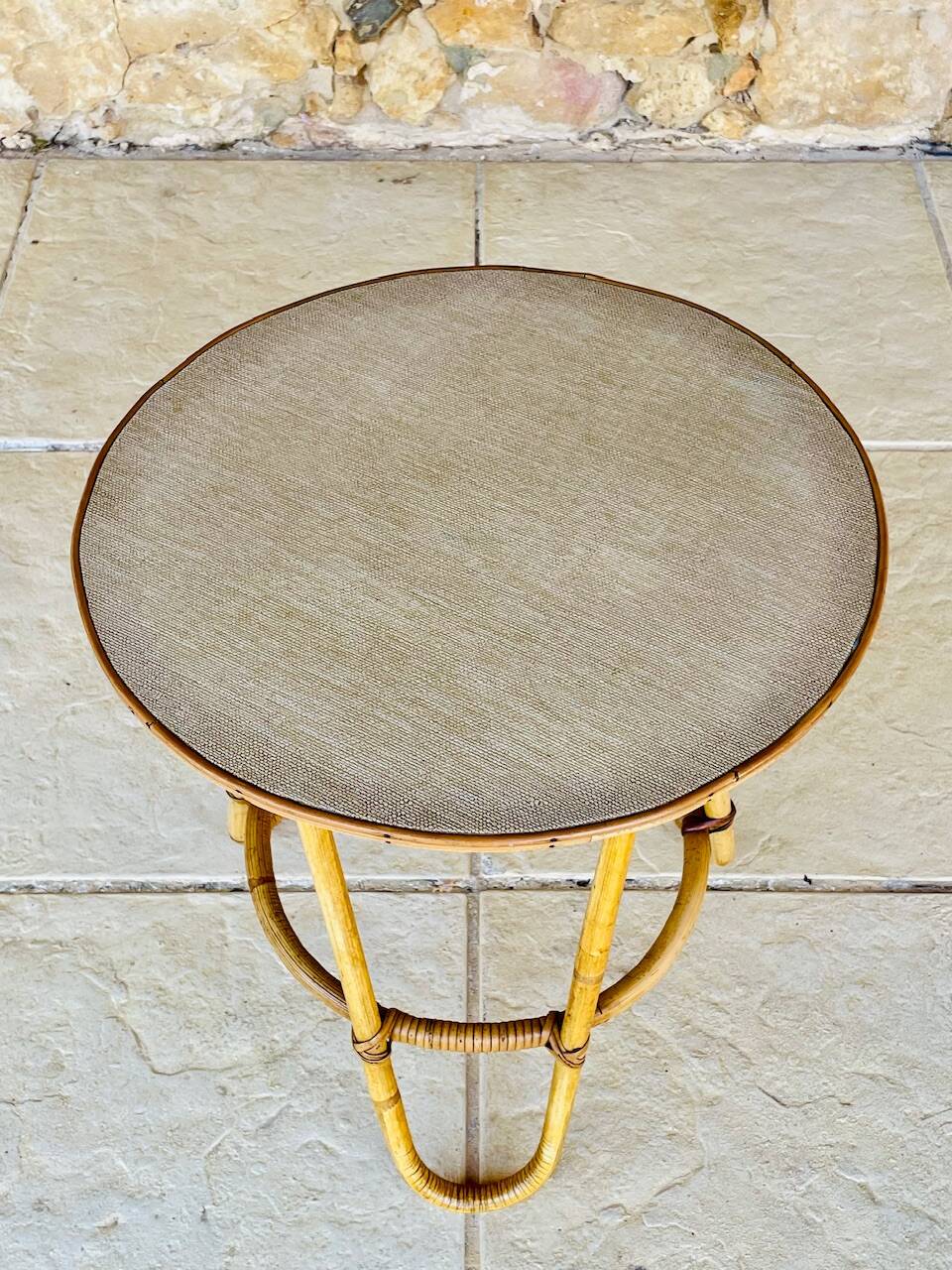 Vintage rattan and bamboo side table, circa 1969.