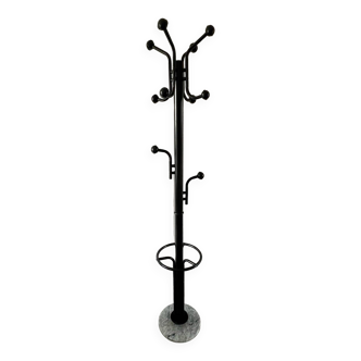 Black metal parrot coat rack on marble base