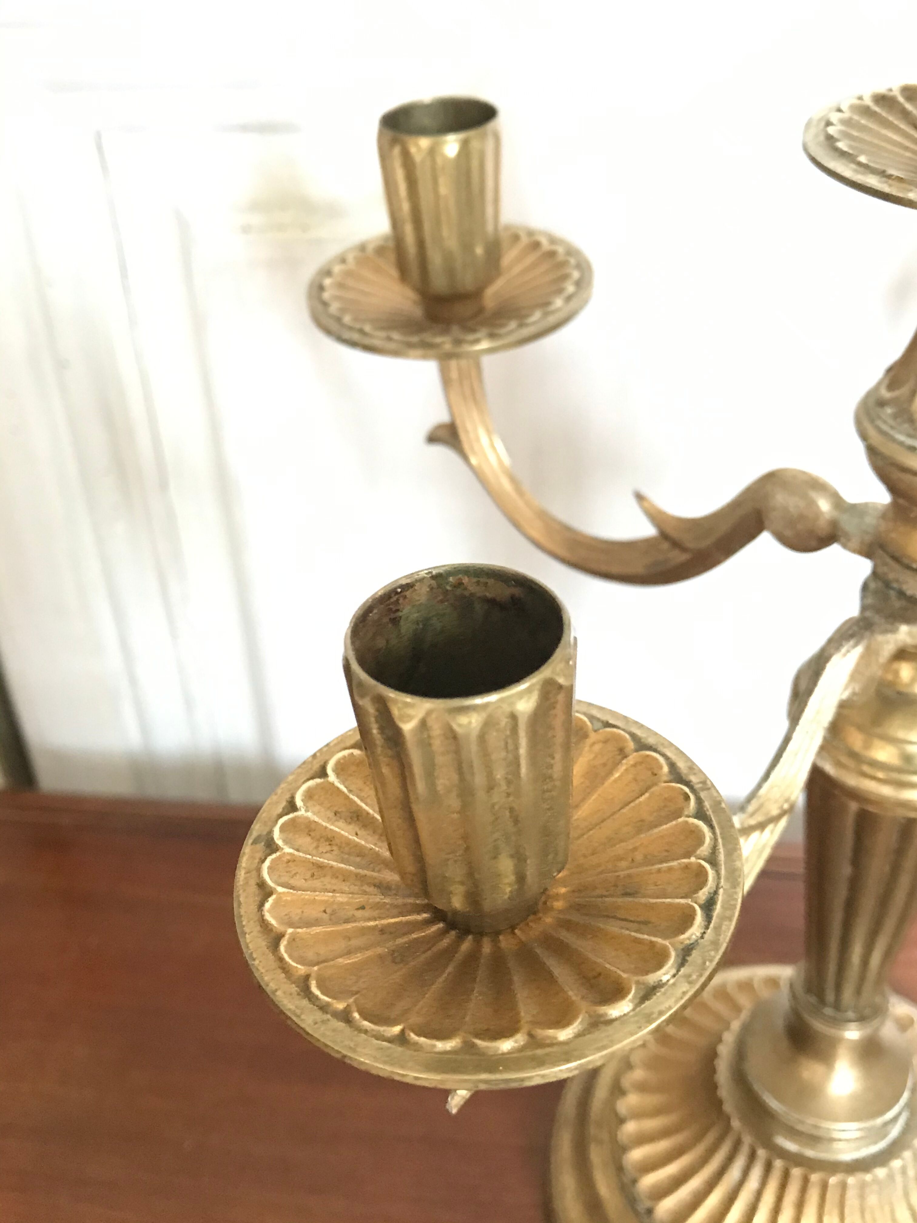 Pair of golden brass candlesticks