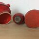 3 red ceramic vases