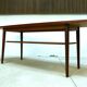 Curved Danish teak coffee table with additional shelf compartment, 1960s