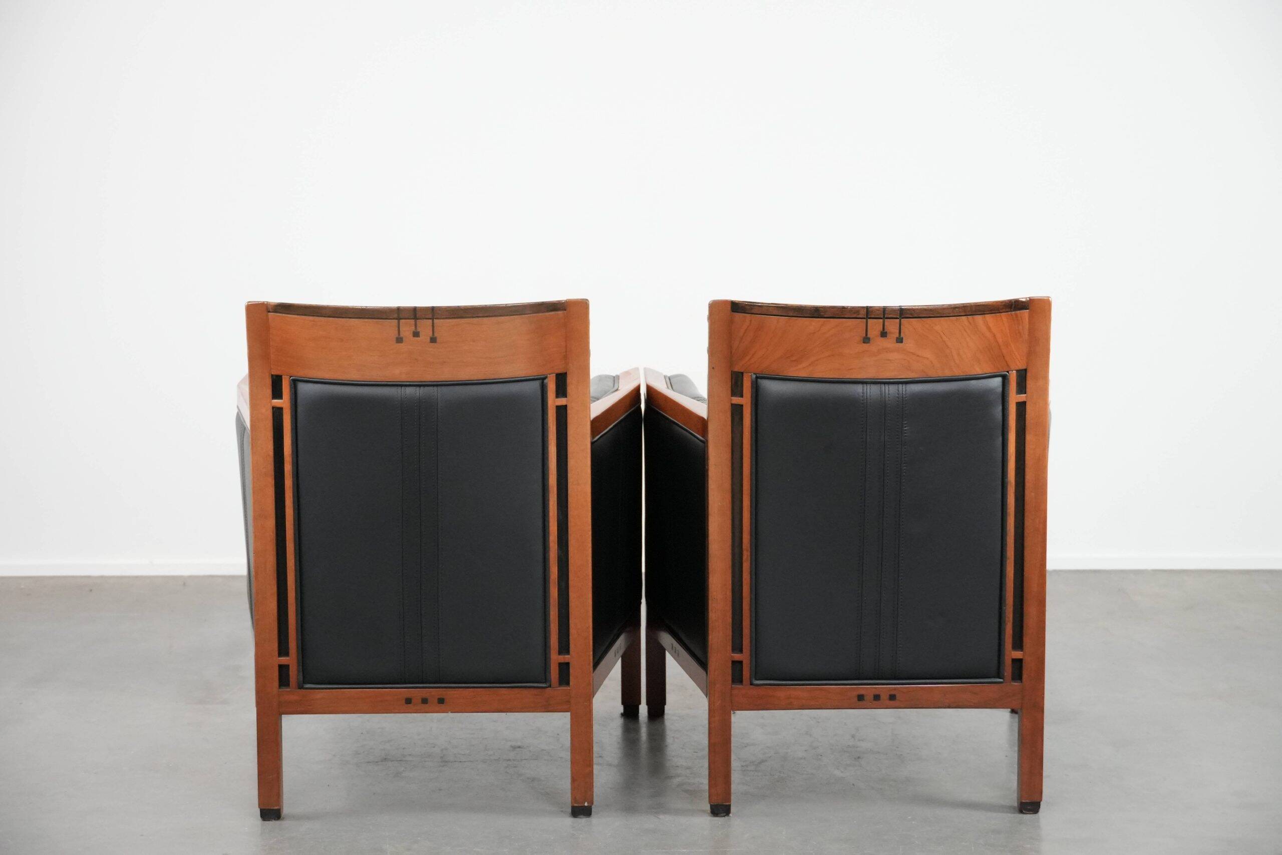 Set of  two black leather Art Deco design armchairs