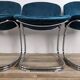 Four 1970s tubular chairs upholstered in blue velvet