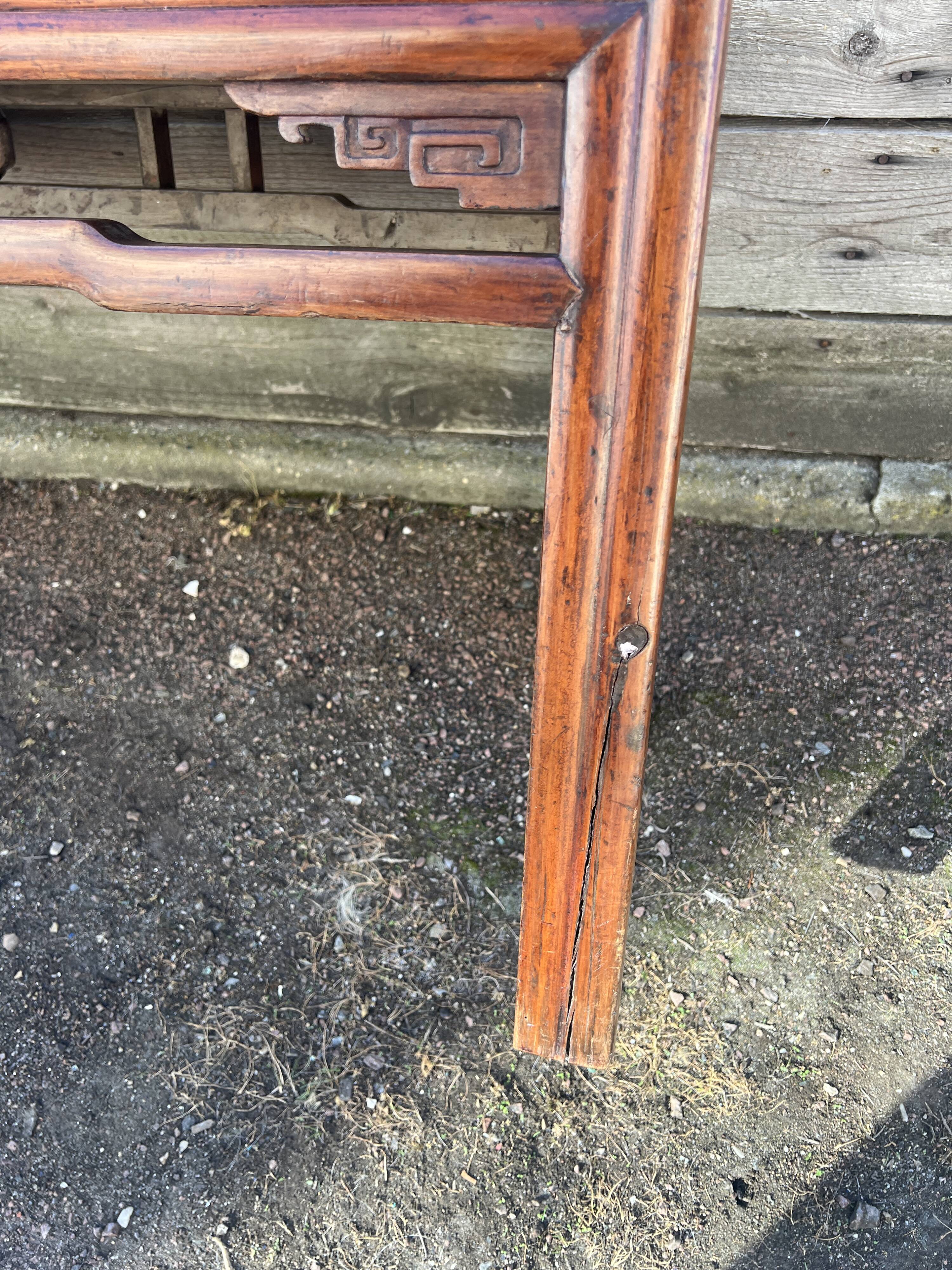 Asian low console in natural wood