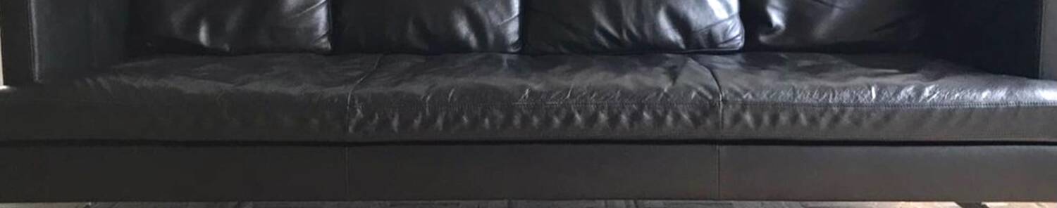 Canapé en cuir noir haut de gamme, Canapé Ligne Roset modèle Stricto Sensu