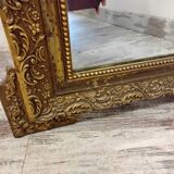 Old gilded stucco mirror