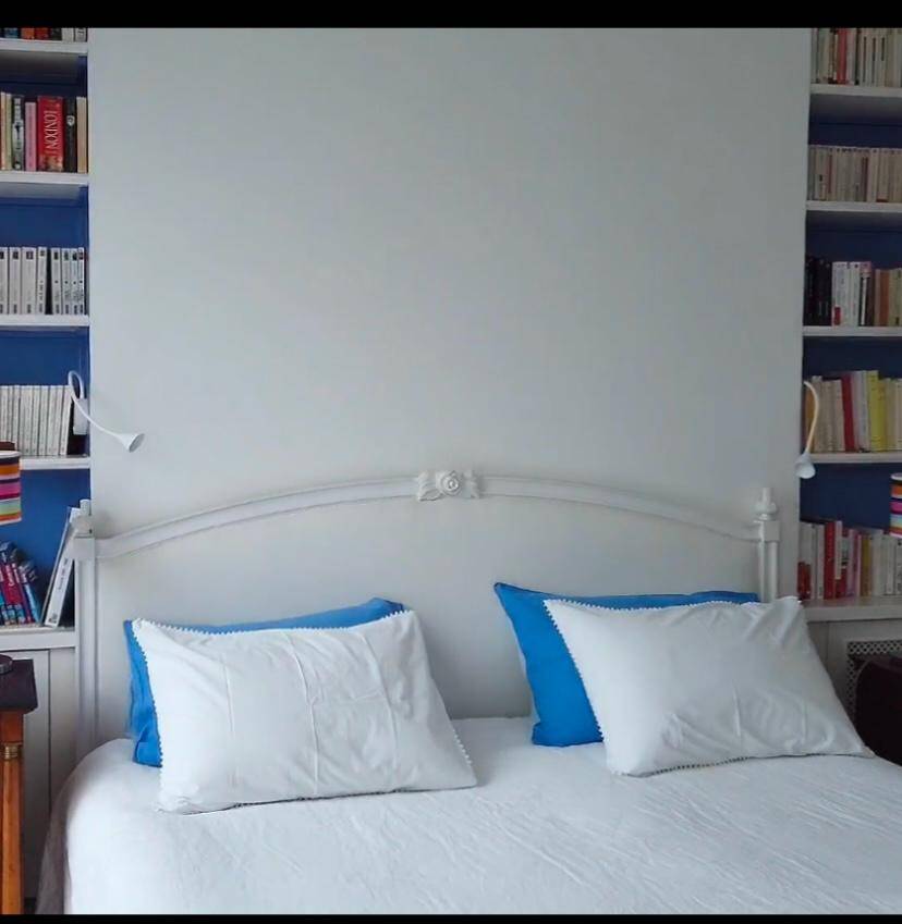 Gustavian style headboard in white wood with linen upholstery