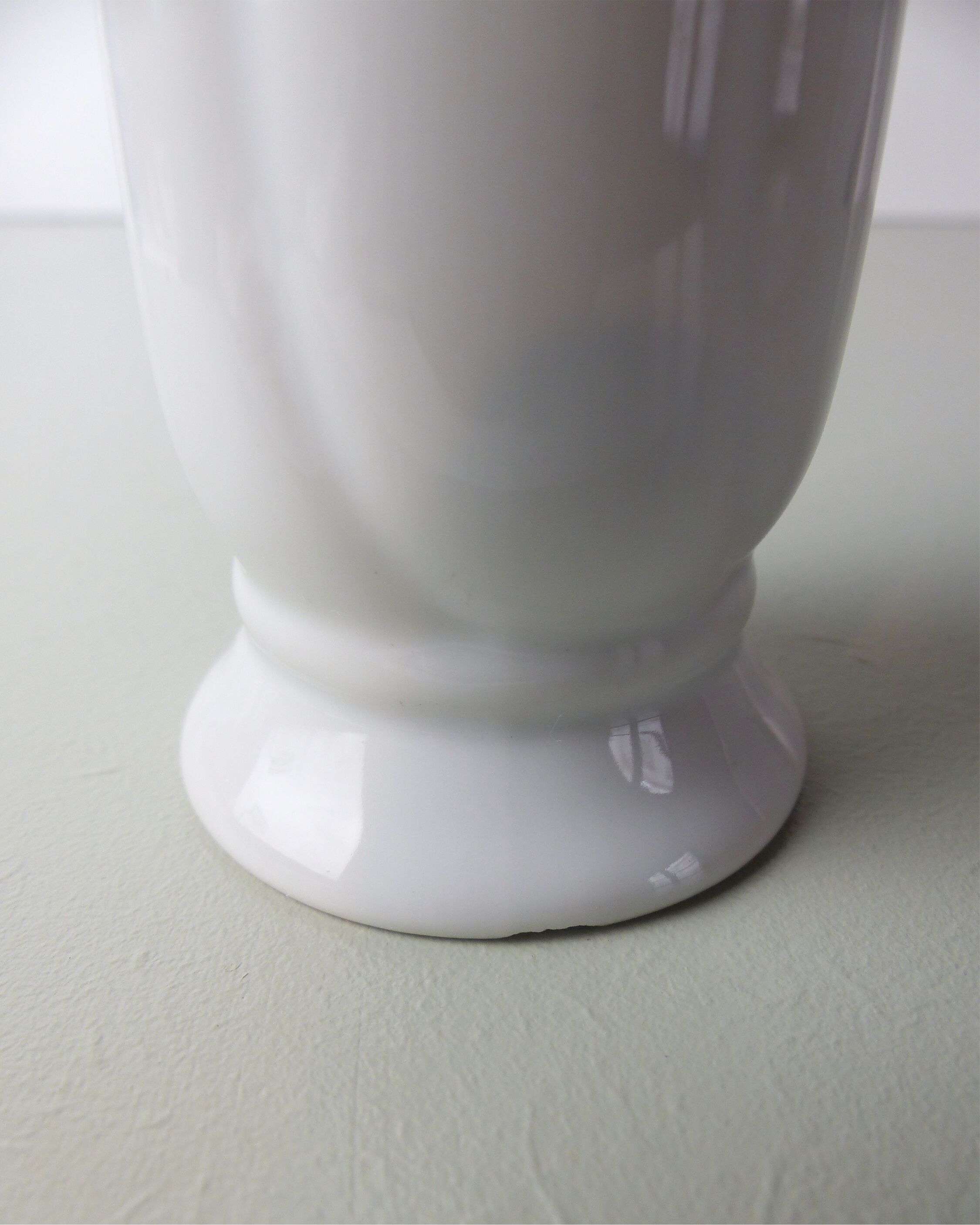White porcelain tube vase