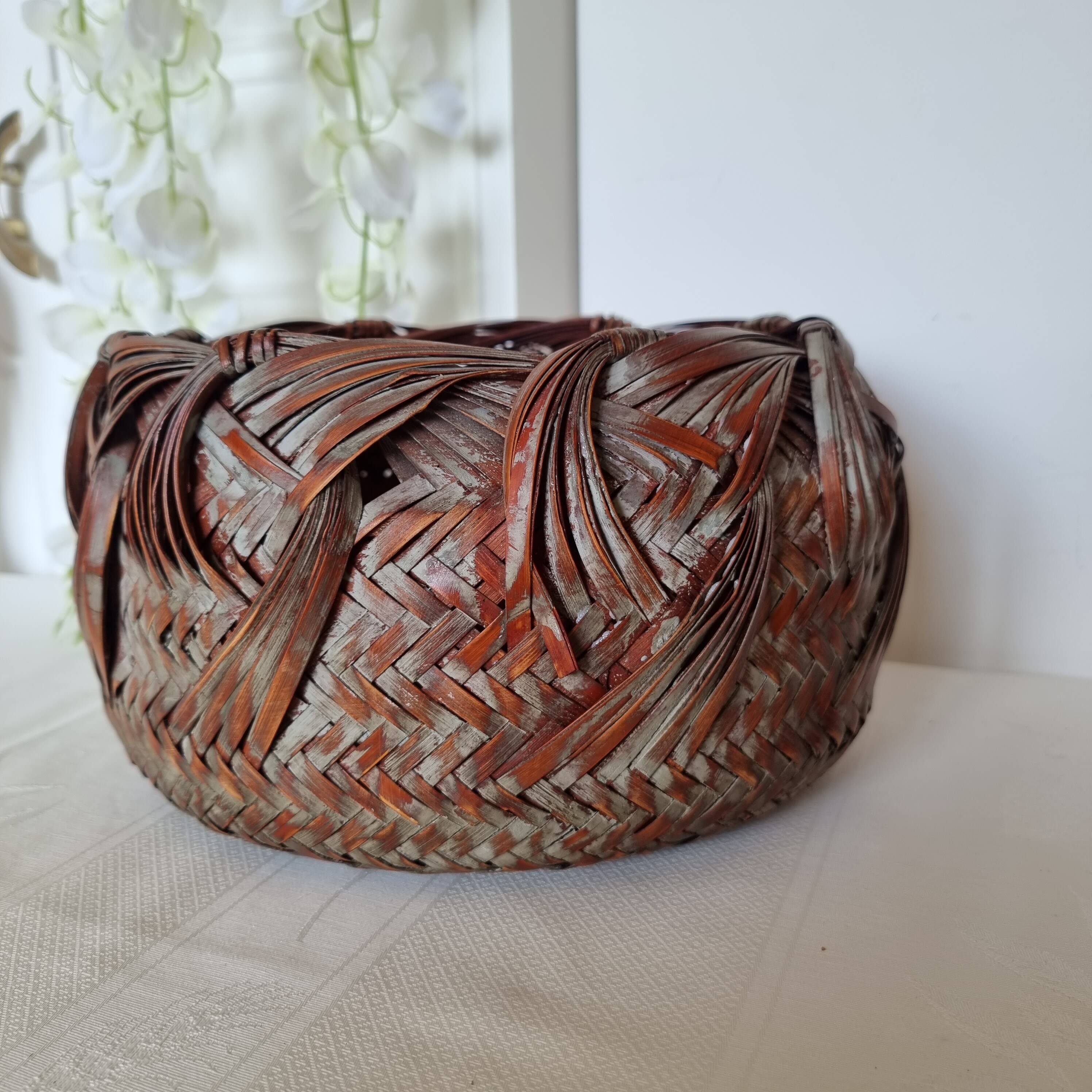Vintage Japanese Ikebana basket made of smoked bamboo in natural