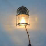 Vintage wallmounted brass lamp from a ship.