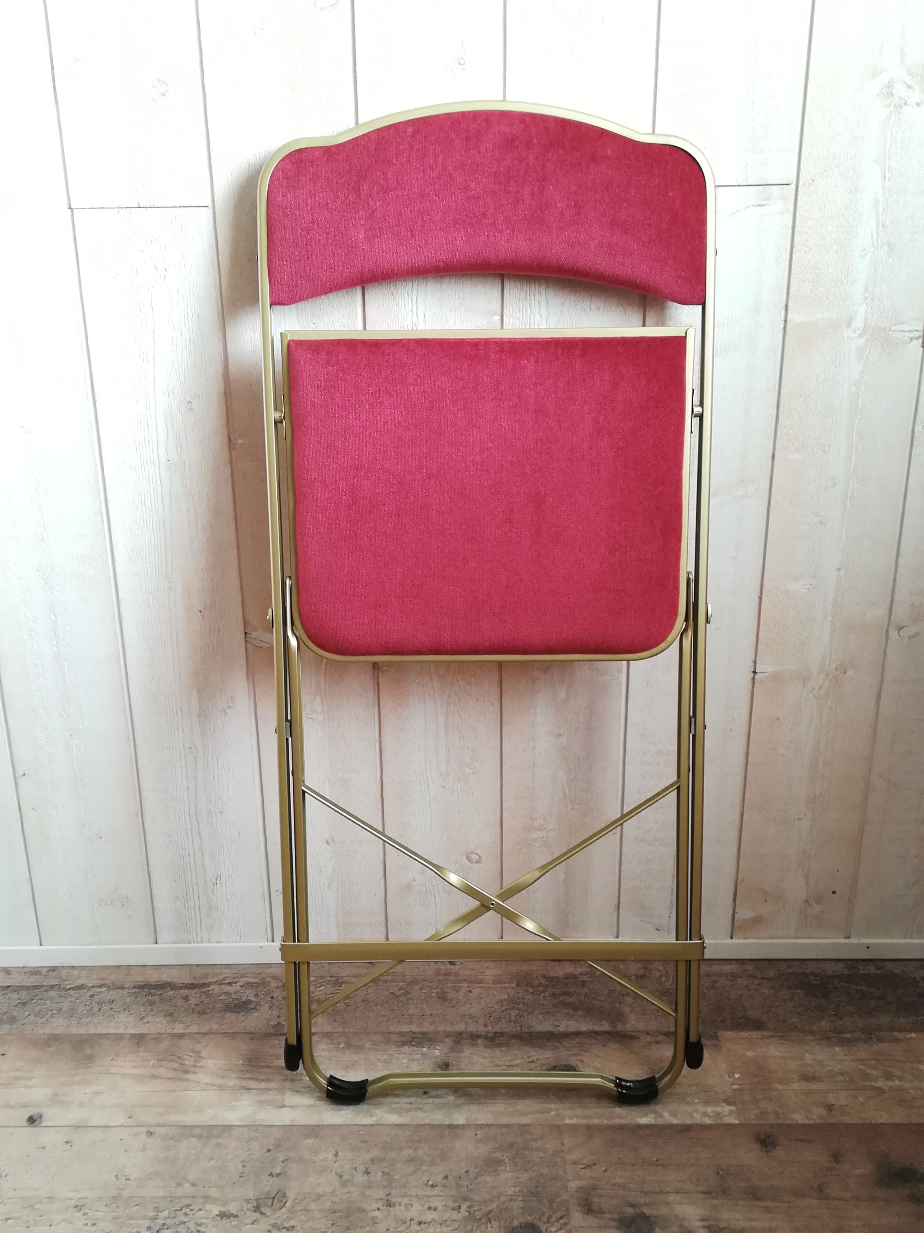 Pink velvet folding chair