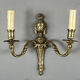 Set of four bronze wall sconces, Louis XVI style, 20th century.