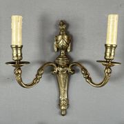 Set of four bronze wall sconces, Louis XVI style, 20th century.