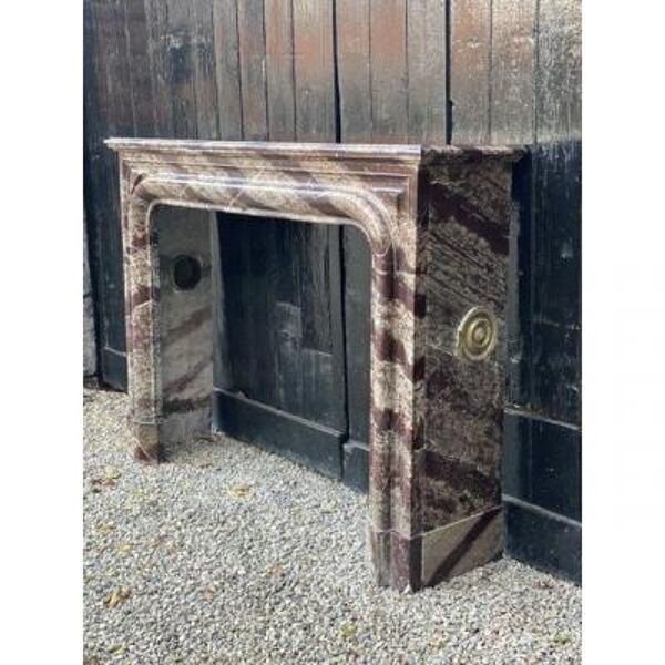 Cheminée de style Louis XIV en marbre Campan Rubané