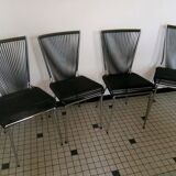 Set of black scoubidou chairs
