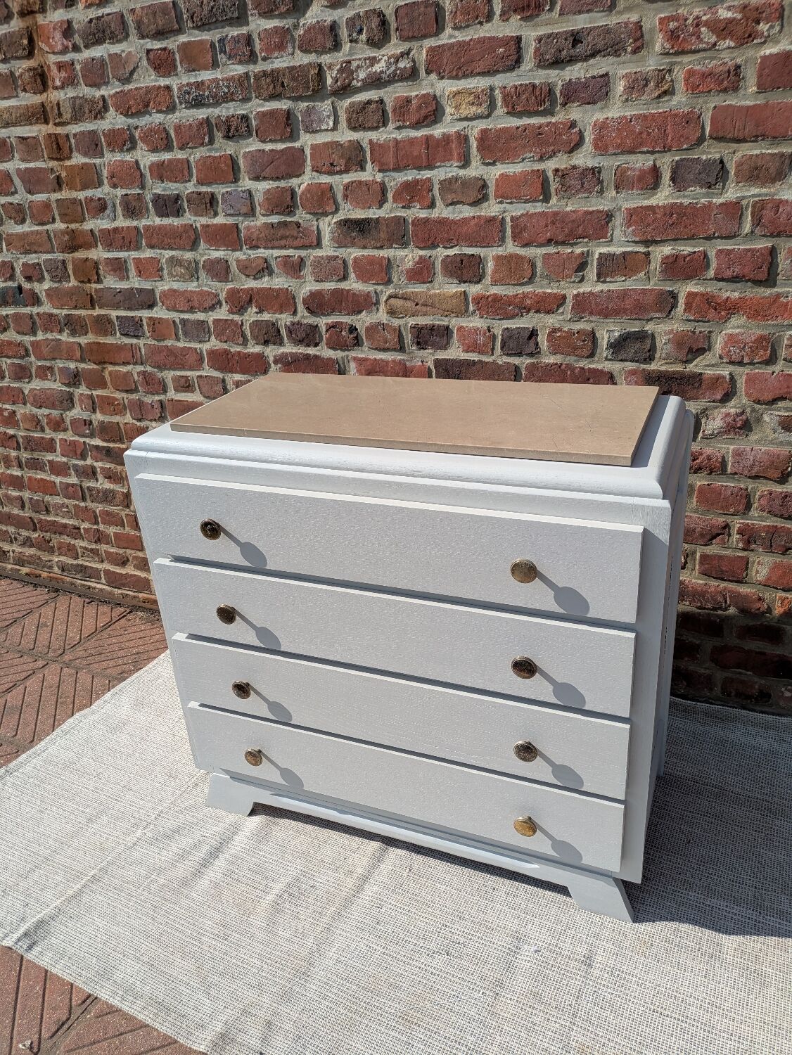 Marble-topped chest of drawers