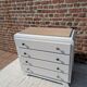 Marble-topped chest of drawers