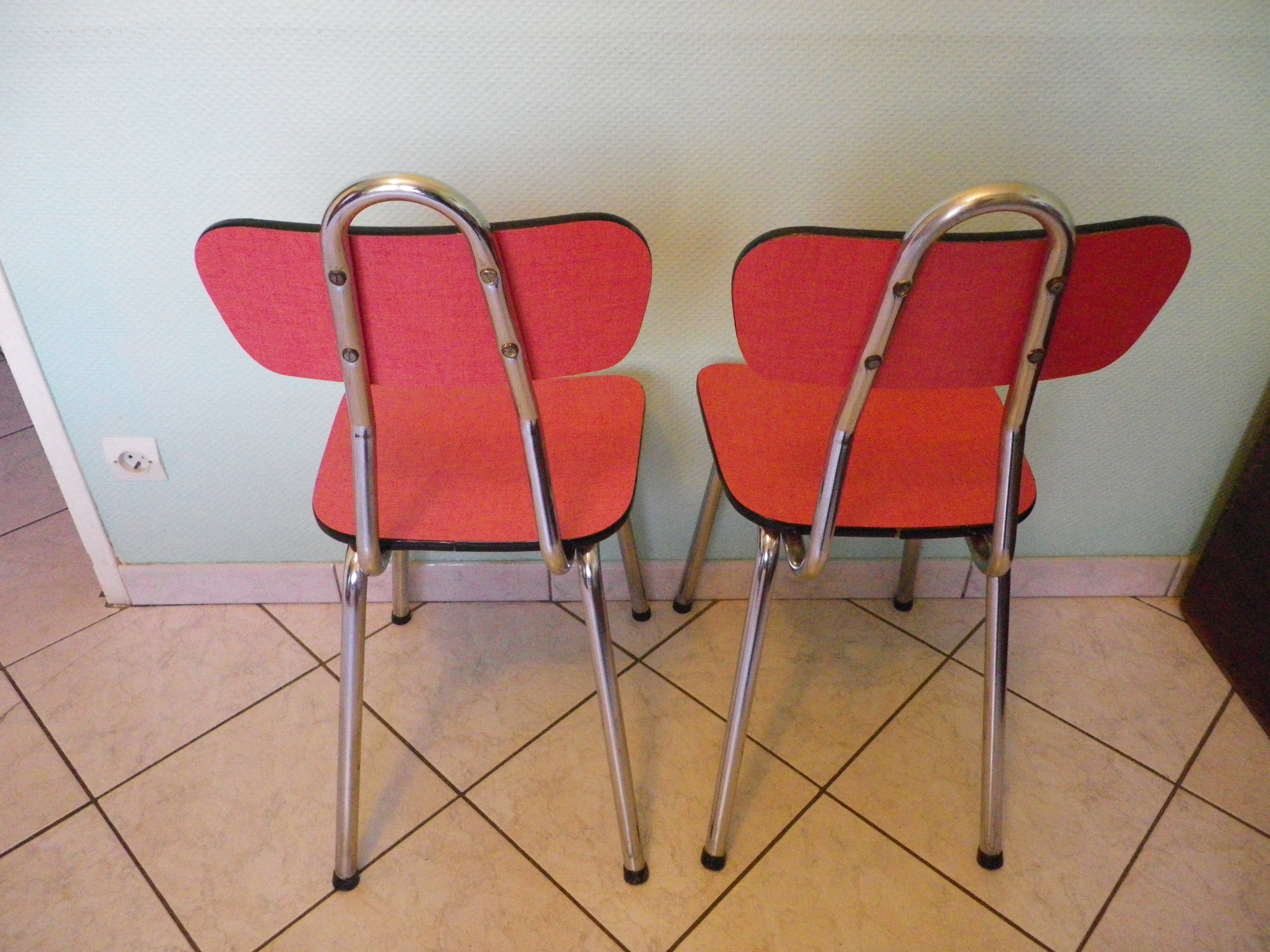 Lot of 2 chairs in red formica with tubing 60s