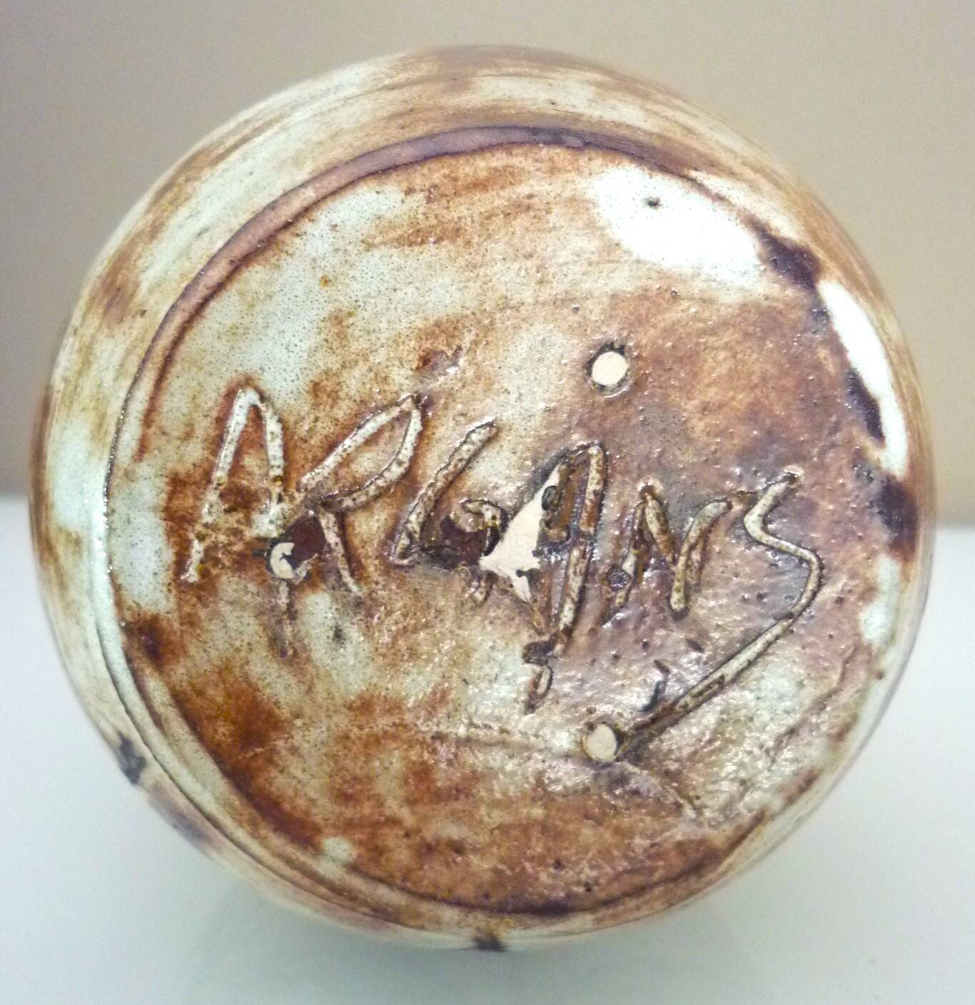 Glazed ceramic drop vase, signed Michel Argans, leaf decoration