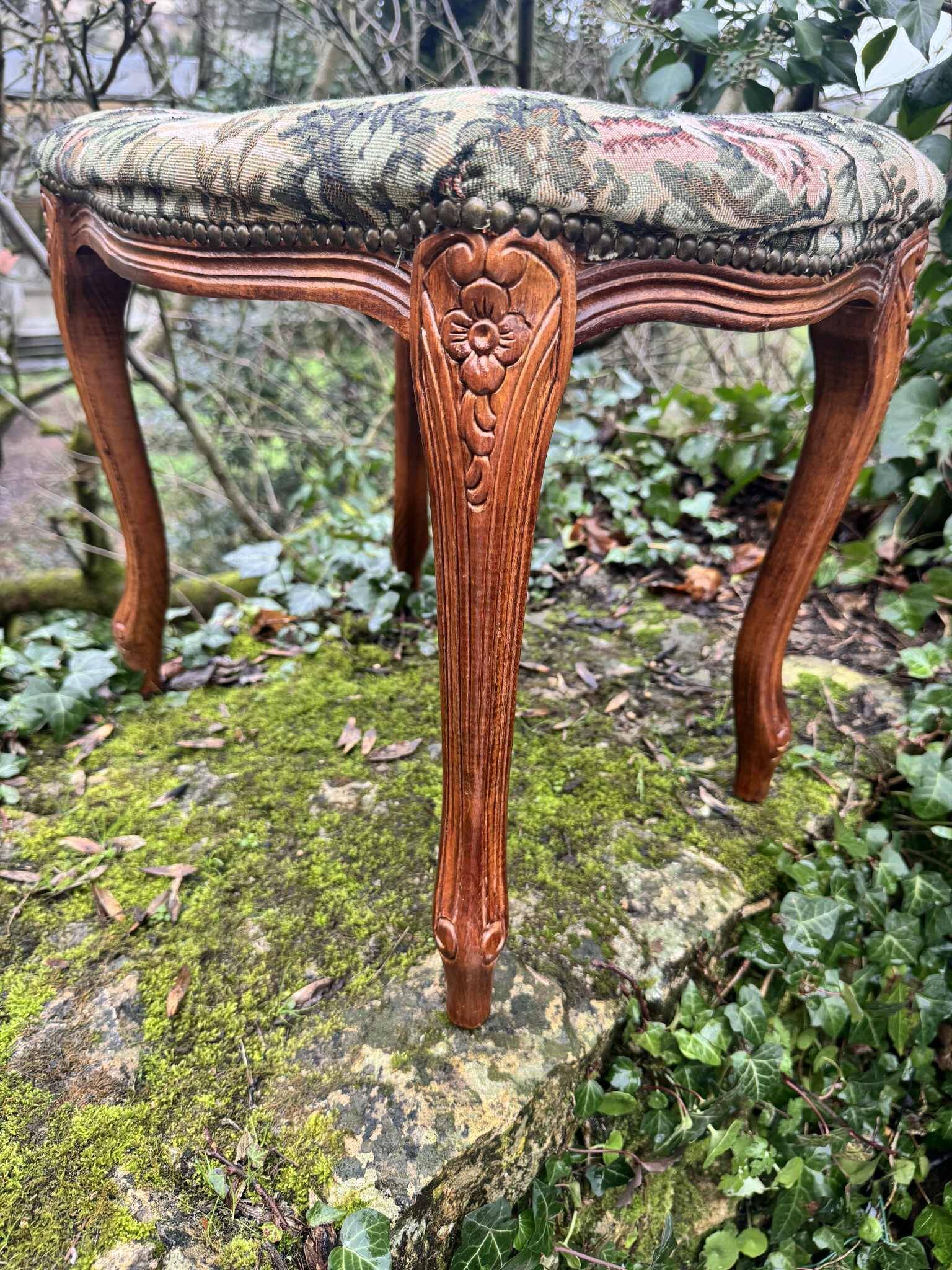 Large antique footrest in the Louis XV style.