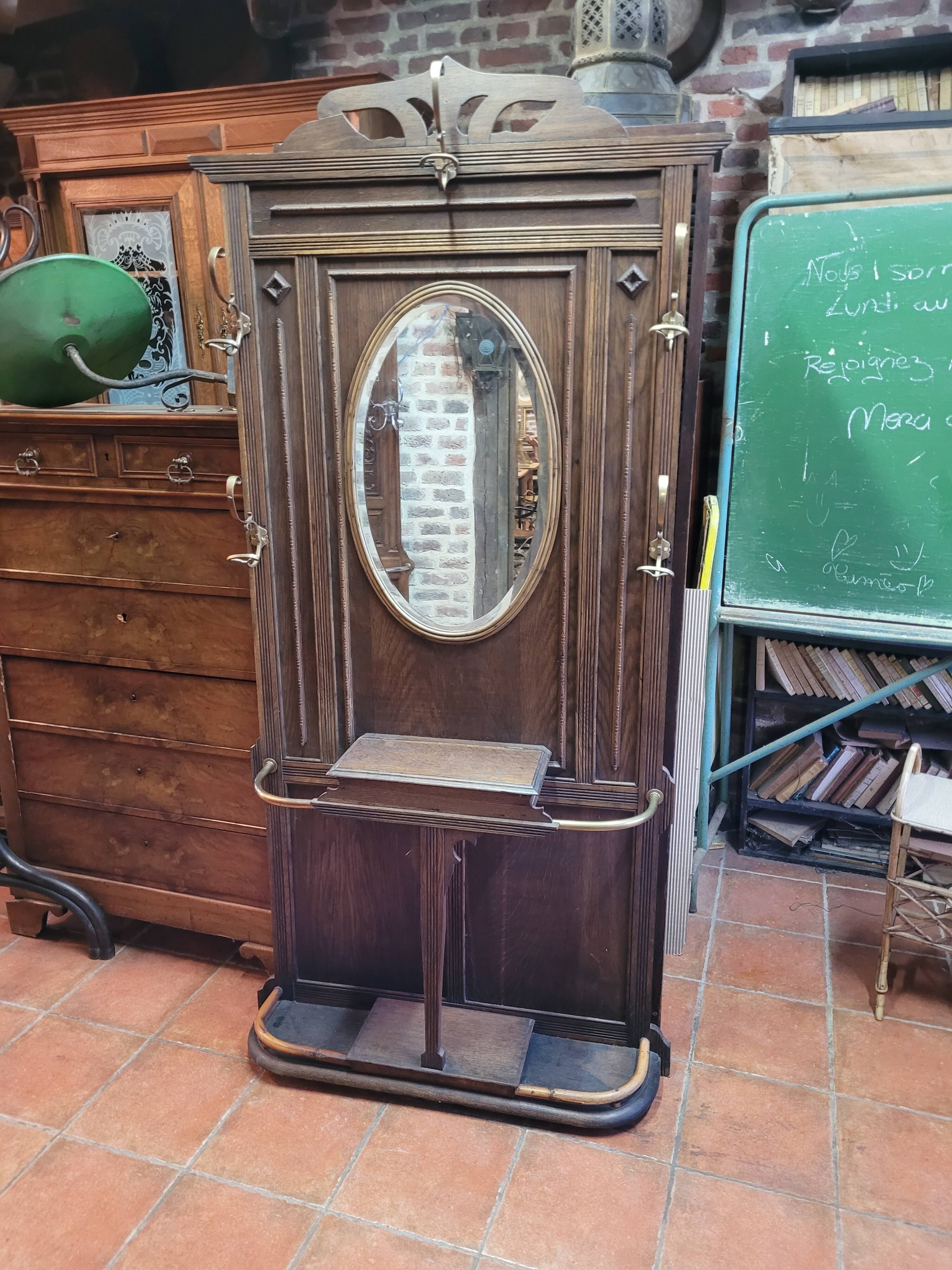 Old cloakroom or coat rack in oak