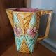 Antique pitcher in Onnaing slipware