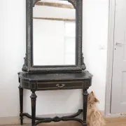Antique 19th-century mirror with griffins and console table