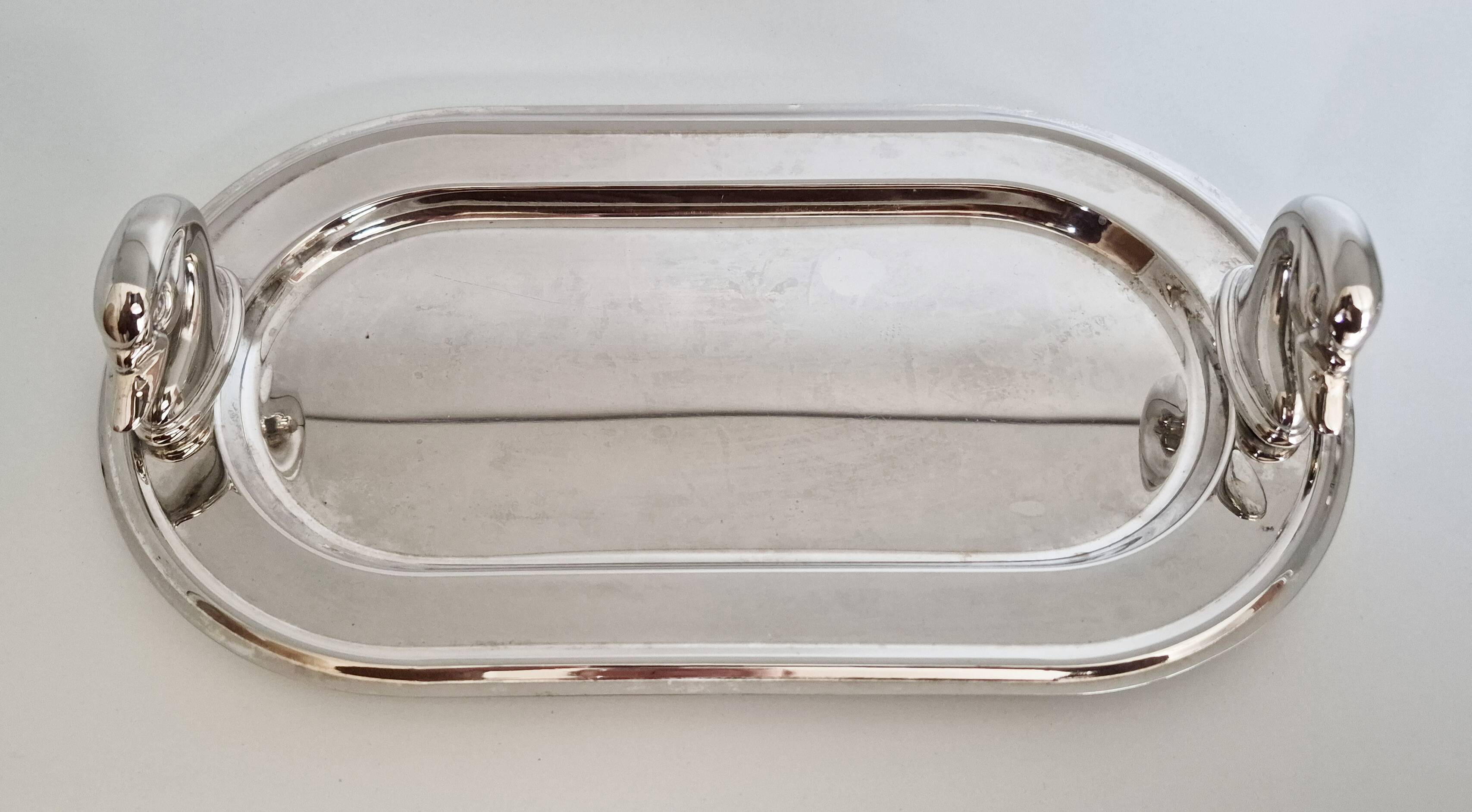 Silver-plated serving dish for foie gras.