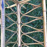 Rattan magazine holder