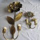 Brass sunflower sconces