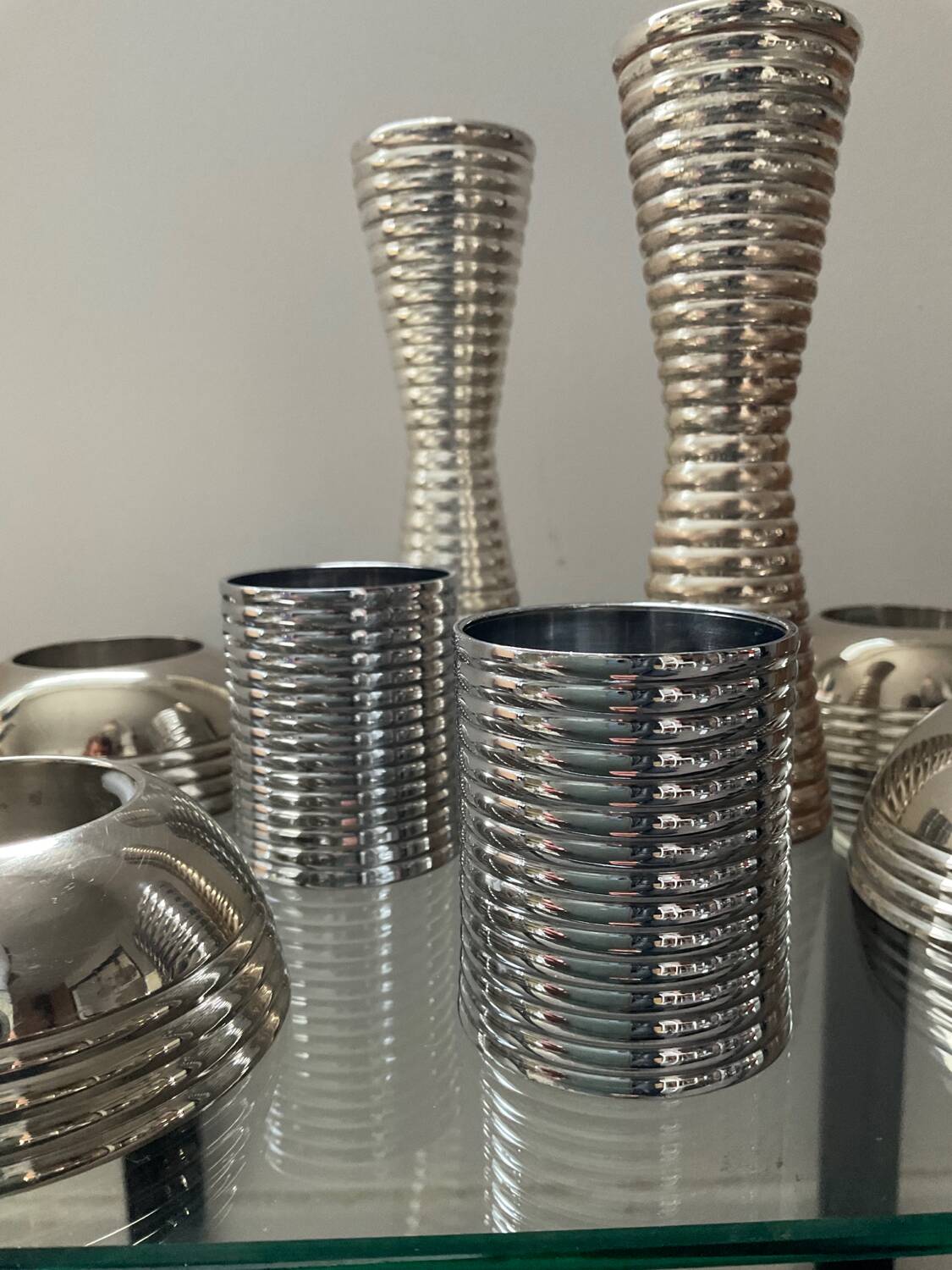 Series of 8 vintage candlesticks in silver metal
