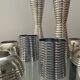 Series of 8 vintage candlesticks in silver metal