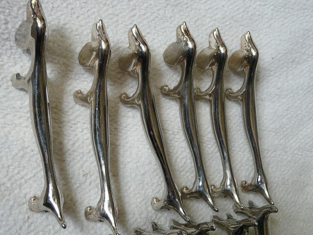 12 silver metal knife holders 6 dogs and 6 cats
