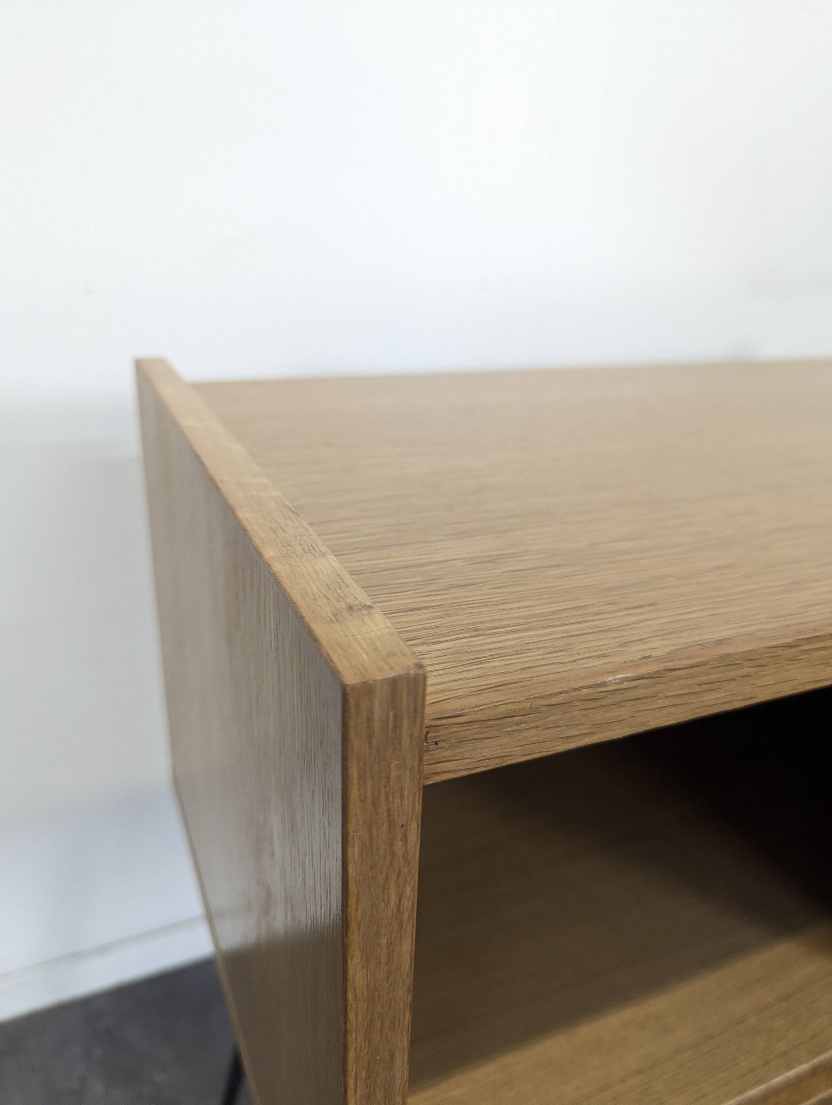 Modernist sideboard with 2 doors in oak veneer.