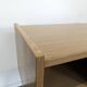 Modernist sideboard with 2 doors in oak veneer.