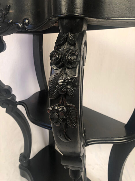 Pair of blackened wooden consoles, marble top